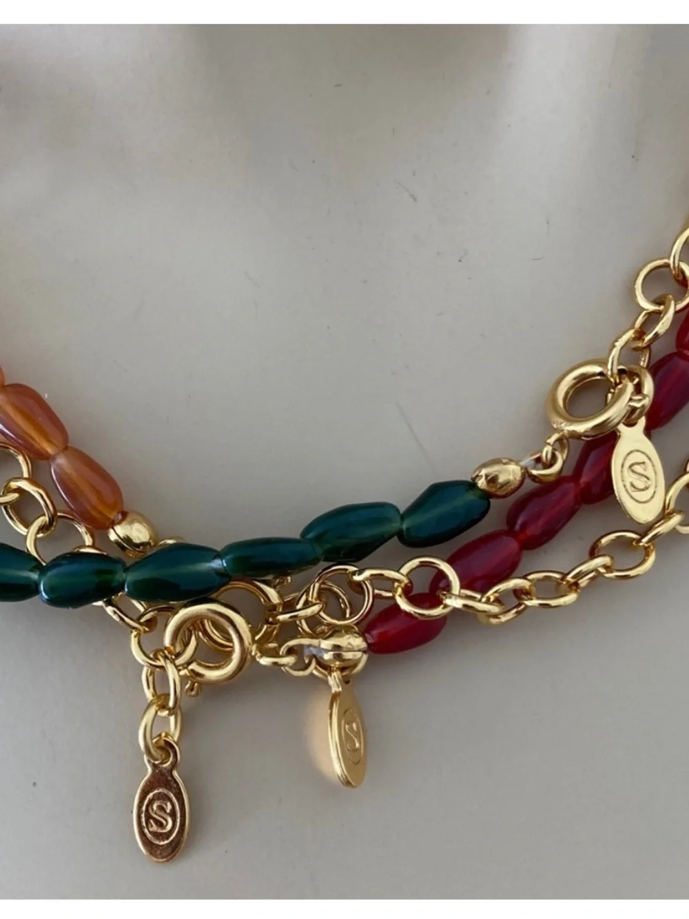 Sezane Flora Earrings, Amandine Bracelet and Clem Necklace
Color: Carmine Red - Picture 11 of 14